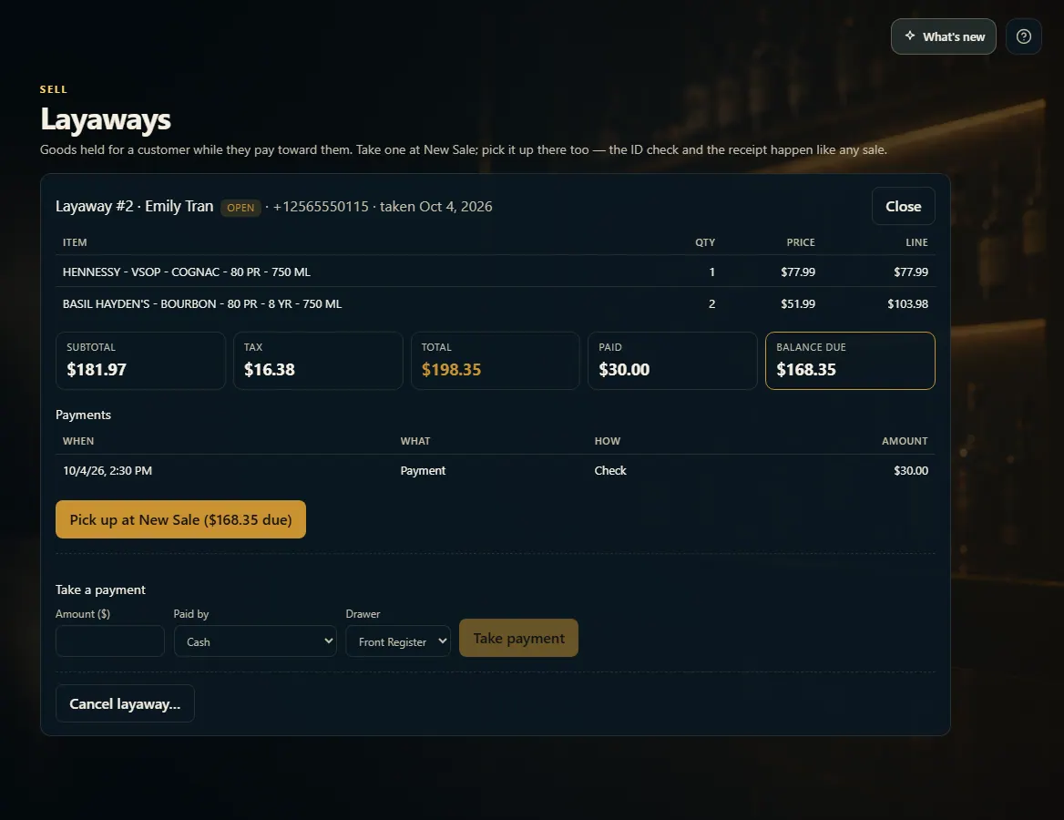 An open layaway with its items, payments, Pick up at New Sale and Take a payment.